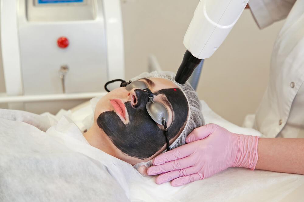 Patient undergoing laser skin lightening