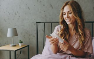 Woman looking at skincare product to decide if it's wrong or right for her skin