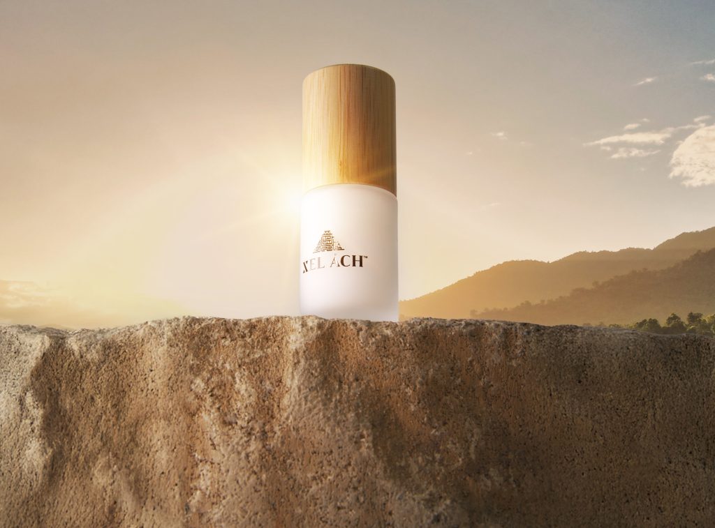 Xel Ach vitamin C serum bottle on stone